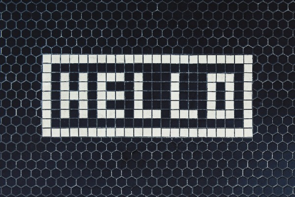 Floor tile that says Hello
